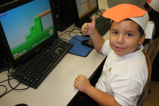 Boy giving thumbsup 550x366 resized 600