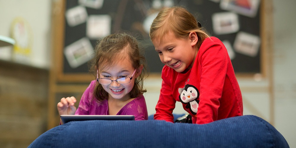 girls-playing-st-math-beanbag
