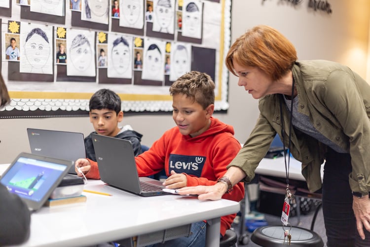 Educator with Students Playing ST Math