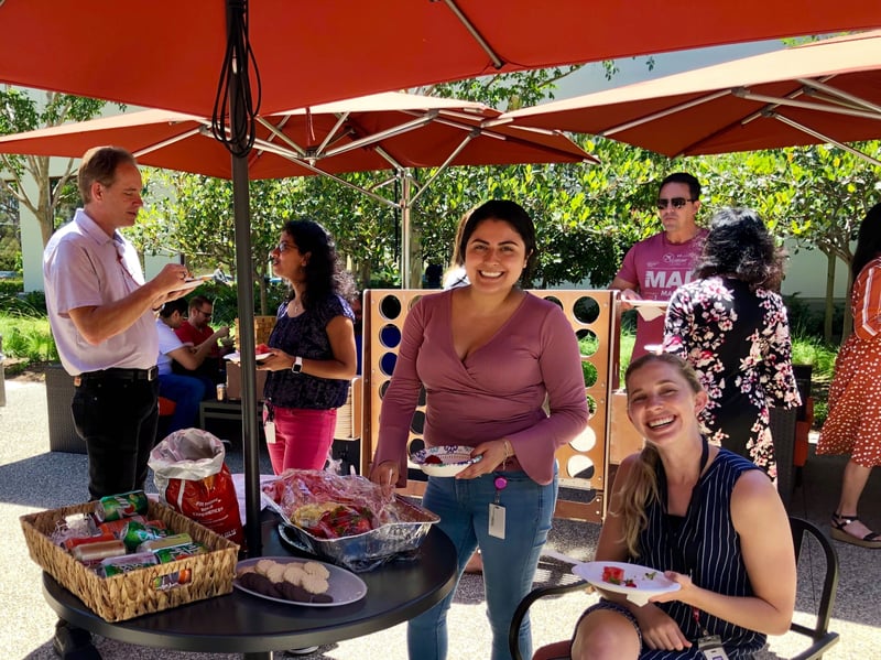 Edith-and-team-smiling-at-barbecue