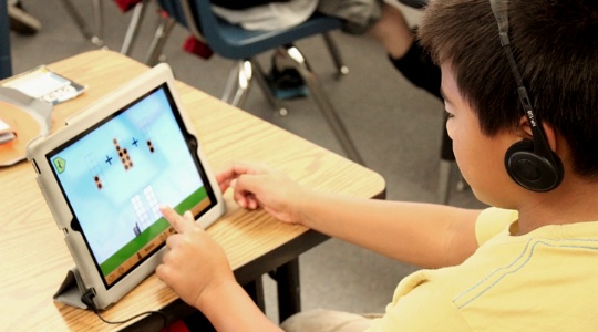 boy-playing-st-math-ipad