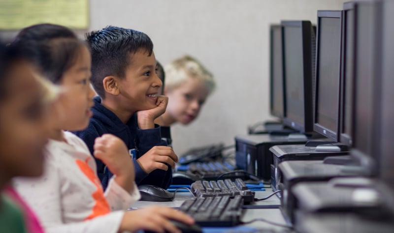 students-computers-boy-smiling-lab