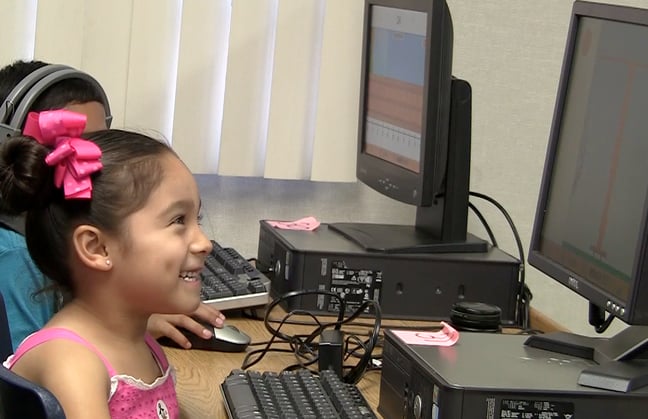 Pinellas_little_girl_at_computer.png